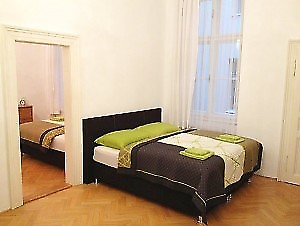 comfortable big bed with wardrobe in the corner
