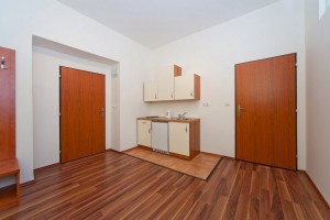 a small kitchenette with major appliances